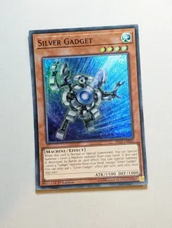 Silver Gadget - FIGA-EN010 - Super Rare - 1st Edition - Yugioh - Image 1