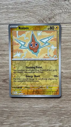 Pokemon Rotom 061/191 SV08: Surging Sparks Common Reverse Holo Card NM - Image 1