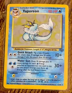1999 POKEMON JUNGLE VAPOREON HOLO CARD 12/64 STAGE 1 80 HP - Image 1