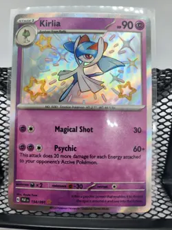 SV: Paldean Fates #154/091 Kirlia Pokemon Card - Image 1