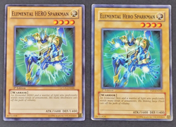 Yugioh TCG - 2x Elemental Hero Sparkman - LCGX-EN006 + YSD-EN010 LP/MP 1st 2006 - Image 1