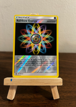 Rainbow Energy 151/168 SM-Celestial Storm Reverse Holo Uncommon LP Pokemon - Image 1