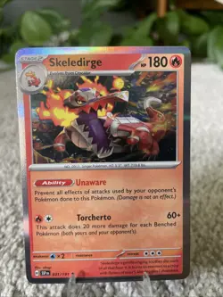 Pokemon TCG Skeledirge Card #031/191 SV08 Surging Sparks Holo - Image 1