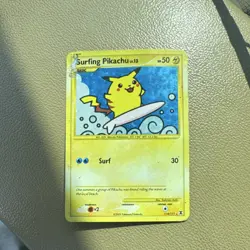 Pokemon Surfing Pikachu 114/111 Rising Rivals Holo Secret Rare 2009 TCG Card - Image 1