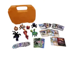 Bakugan Battle Brawlers lot Of 7, yellow case, 25 cards, 14 core magnets - Image 1