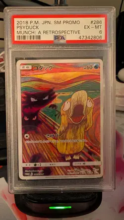 2018 Pokemon Japanese Psyduck 'Munch A The Scream' 286/SM-P Promo - PSA 6 - Image 1