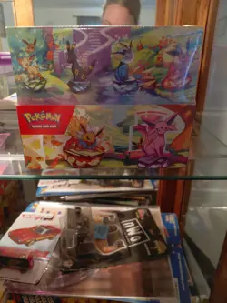 Pokemon prismatic evolutions tins display box nwt sealed - Image 1