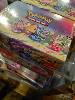 Pokemon prismatic evolutions tins display box nwt sealed - Image 2
