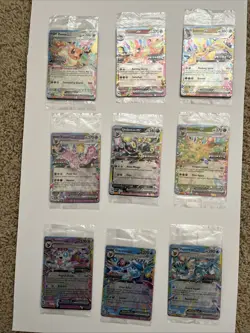 Pokemon Prismatic Evolutions Stamped SEALED PROMOS 9 Card Set and FREE Eevee - Image 1