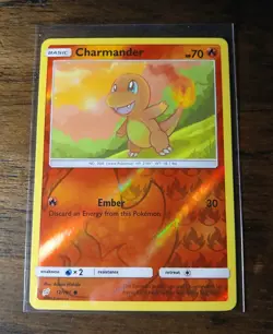 2019 Pokemon Charmander 12/181 Sm-Team Up Reverse Holo NM/NM+ Condition - Image 1