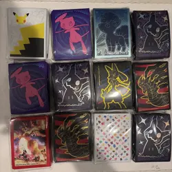 Mixed Lot Of 12 Pokemon Card Sleeves New Sealed Few Repeats - Image 1