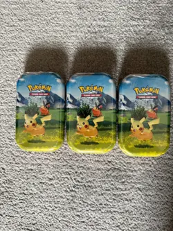 Pokemon TCG: Mega Evolution—Ascended Heroes Mini Tin: Pikachu & Tepig x3 - Image 1