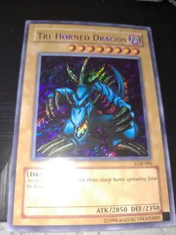 Yu-Gi-Oh! Tri-Horned Dragon LOB-000 Unlimited Secret Rare Lightly Played - Image 1