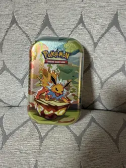 Pokemon TCG Scarlet & Violet Prismatic Evolutions Jolteon Mini Tin Sealed - Image 1