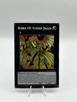 Yugioh Number 100: Numeron Dragon BLCR-EN084 Secret Rare 1st Ed Near Mint - Image 1
