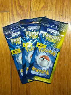 Presstine Prime Pokemon 3 Packs! 8 Cards 2 bonuse cards in each. BRAND NEW - Image 1