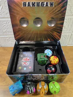 BAKUGON Storage Tin w/ 8 Brawlers & Unopened Card Pack, Spin Master, Preowned - Image 1
