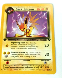 2000 Pokemon Team Rocket Vintage First Edition Dark Jolteon Card - Image 3