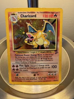 Charizard 4/130 Holographic DMG Condition - Pokemon Base Set 2 - Image 1