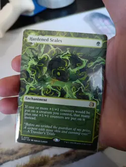 MTG - Hardened Scales - Wilds of Eldraine: Enchanting Tales - R 0055 - Image 1