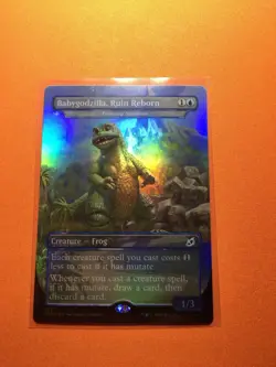MTG Magic The Gathering Babygodzilla LP Foil IKO Borderless - Image 1