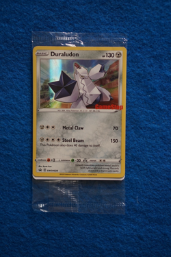 2020 Pokemon (TCG) #SWSH028 Duraludon holo sealed Game Stop stamped promo logo - Image 1