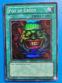 Lightly Played Yugioh Pot Of Greed Super Rare DB1-EN134 - Image 1