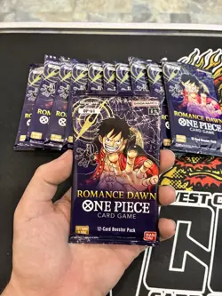 One Piece Romance Dawn OP-01 Factory Sealed 12 card Booster Pack English - Image 1