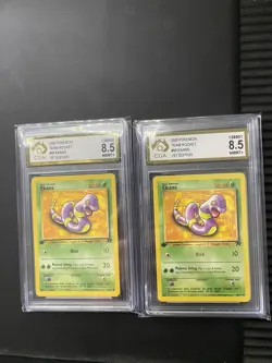 Ekans 56/82 - 2000 1st Edition Team Rocket Pokemon Card - CGA 8.5 NM/MINT+ - Image 1