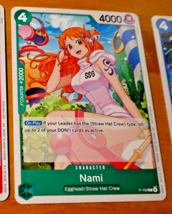 ONE PIECE CARD GAME PROMO CARTE ENGLISH NAMI P-102 EN JCC MINT - Image 1