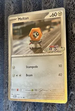 [Stamped] Meltan 102/142 Stellar Crown Stamped Cosmo Foil - Pokemon TCG Promo - Image 3