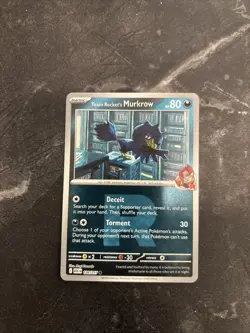 Team Rocket’s Murkrow 126/217 Reverse Holo Pokemon Card - Image 1