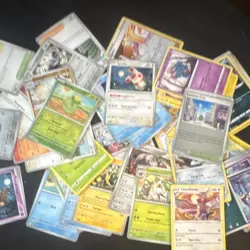 Pokemon TCG Mixed Card Lot 50 cards. Including uncommon/holos/perfect order card - Image 1