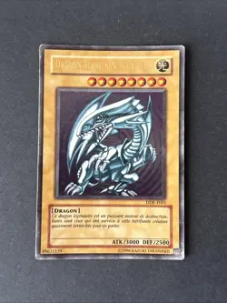 CARTE Yu Gi Oh DRAGON BLANC AUX YEUX BLEUS LCKC-FR001 1ere edition - Image 1