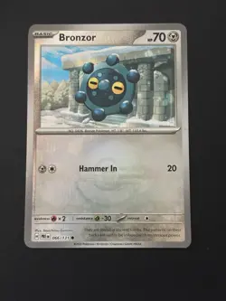 Pokemon TCG Prismatic Evolutions Poke ball Pattern Bronzor 066/131 Holo Card NM - Image 1