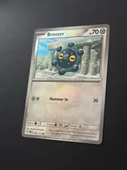 Pokemon TCG Prismatic Evolutions Poke ball Pattern Bronzor 066/131 Holo Card NM - Image 2