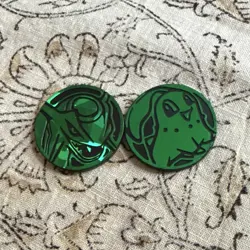 Pokemon Coins - Chikorita Green Reflective and Rayquaza Cracked Ice - Image 1