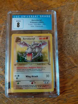 Aerodactyl Pokemon Fossil 1st Edition 1/62 Holo Prerelease CGC NM/Mint + 8 - Image 1