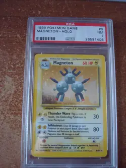 1999 Pokemon Game, Magneton 009/102 Base Set Holo PSA 7, NM - Image 1