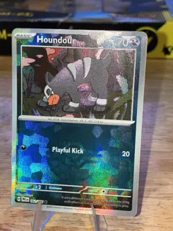 Pokemon TCG Houndour 062/131 Sv: Prismatic Evolutions Holo Pokeball - Image 1