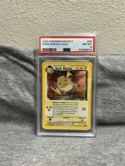 Wizards of the Coast 2000 Pokemon Team Rocket Dark Raichu 83/82 Holo PSA 8 - Image 1