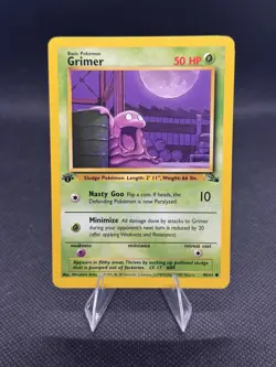 Pokemon TCG Grimer Fossil 1st Edition Common Card 48/62 NM Condition - Image 1