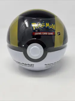 New Sealed Pokemon TCG Poke Ball Black/Gold Tin with 3 Booster Packs & 1 Coin - Image 1
