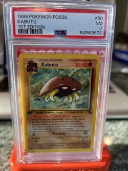 1999 POKEMON FOSSIL 1ST EDITION #50 KABUTO PSA 7 - Image 1