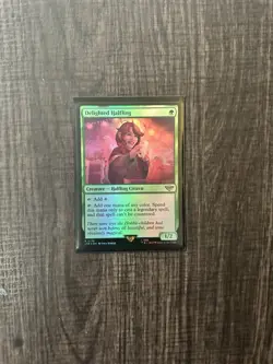 Wizards of the Coast MTG Delighted Halfling Rare Foil LotR Card - Image 1