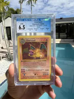 Charizard 1st Edition Shadowless Base Set Holo CGC 6.5 Pokemon Card 4/102 - Image 1