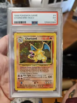 1999 Pokemon Charizard Base Set Holo Rare Card 4/102 PSA 5 - Image 1