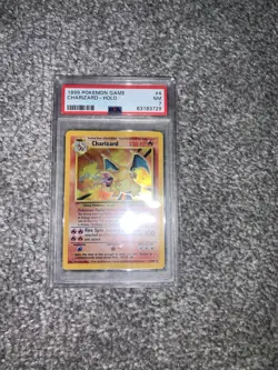 PSA 7 Charizard 4/102 Base Set Rare Holo Pokemon Card 1999 WOTC - Near Mint - Image 1