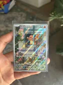 Pokemon TCG Charmander Scarlet & Violet Promo minor wet spot on top - Image 1