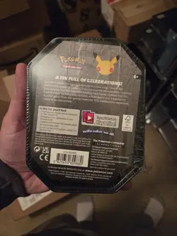 Pokemon TCG Celebrations Lance’s Charizard V Tin 25th Anniversary Factory Sealed - Image 2